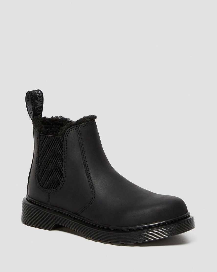 svarta dr martens 2976 chelsea-stövlar med fuskpälsfoder för barn