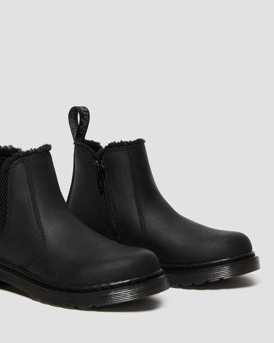 svarta dr martens 2976 chelsea-stövlar med fuskpälsfoder för barn