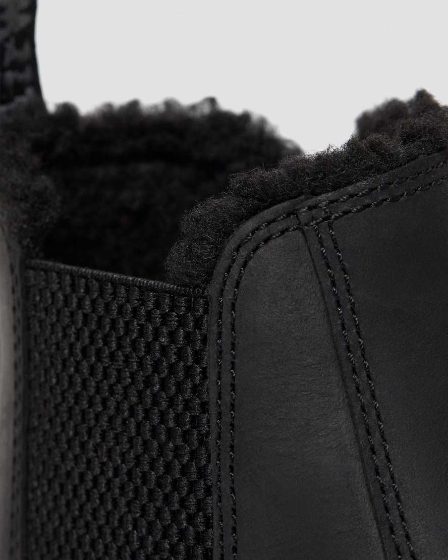 svarta dr martens 2976 chelsea-stövlar med fuskpälsfoder för barn