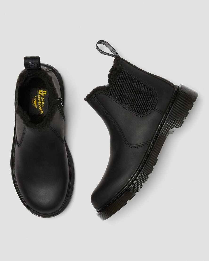 svarta dr martens 2976 chelsea-stövlar med fuskpälsfoder för barn