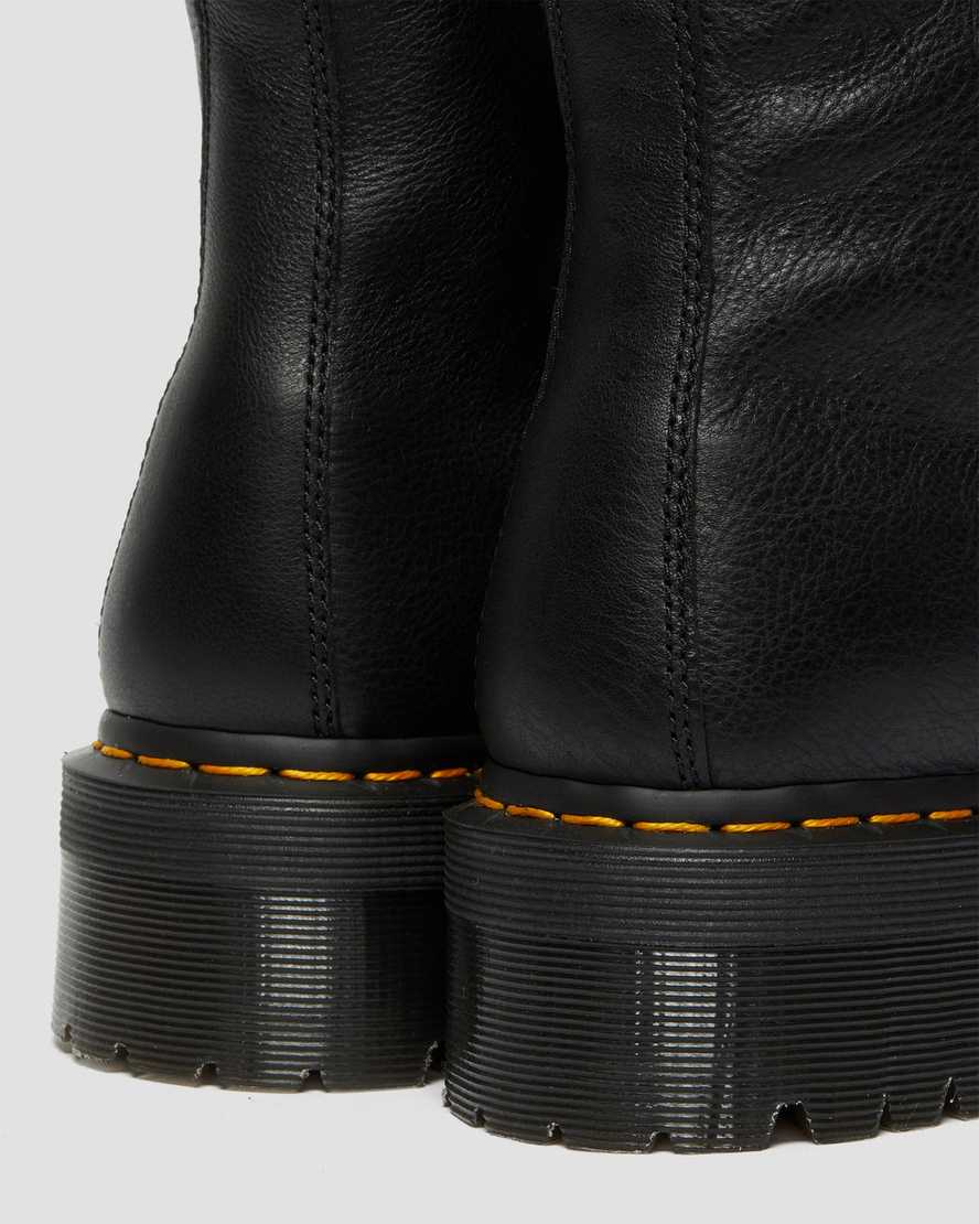 svarta dr martens jadon fodrade platåstövlar med fuskpäls för herr