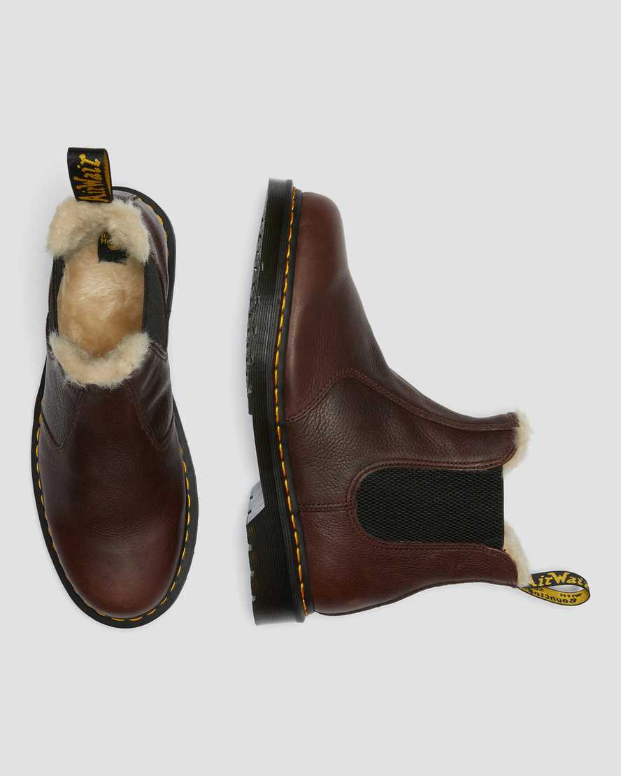 bruna dr martens 2976 chelsea-stövlar med fuskpälsfoder för kvinnor