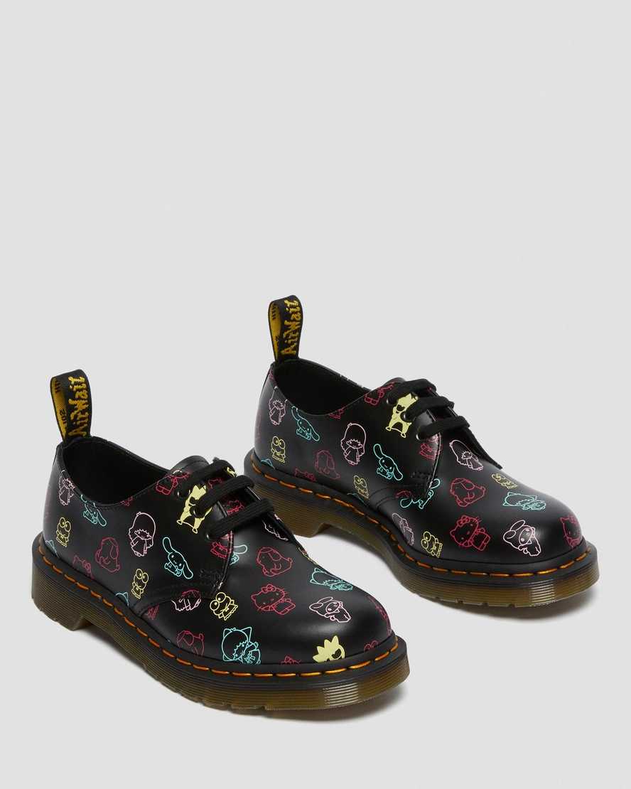 svarta dr martens hello kitty friends 1461 smooth oxfordskor för dam